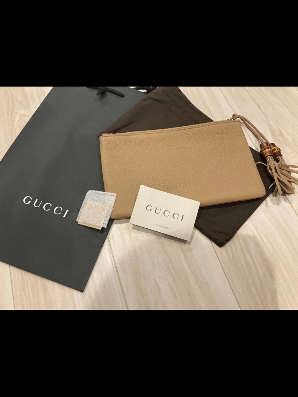 Gucci Tan Pebbled Leather Tassel Wristlet Pouch